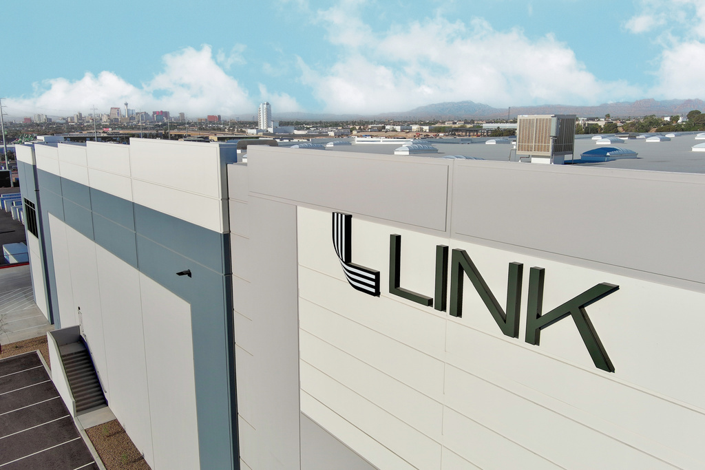 Link logo on the side of a building